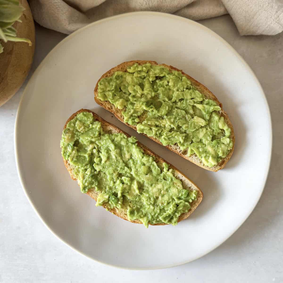 overhead view of avocado on toast.