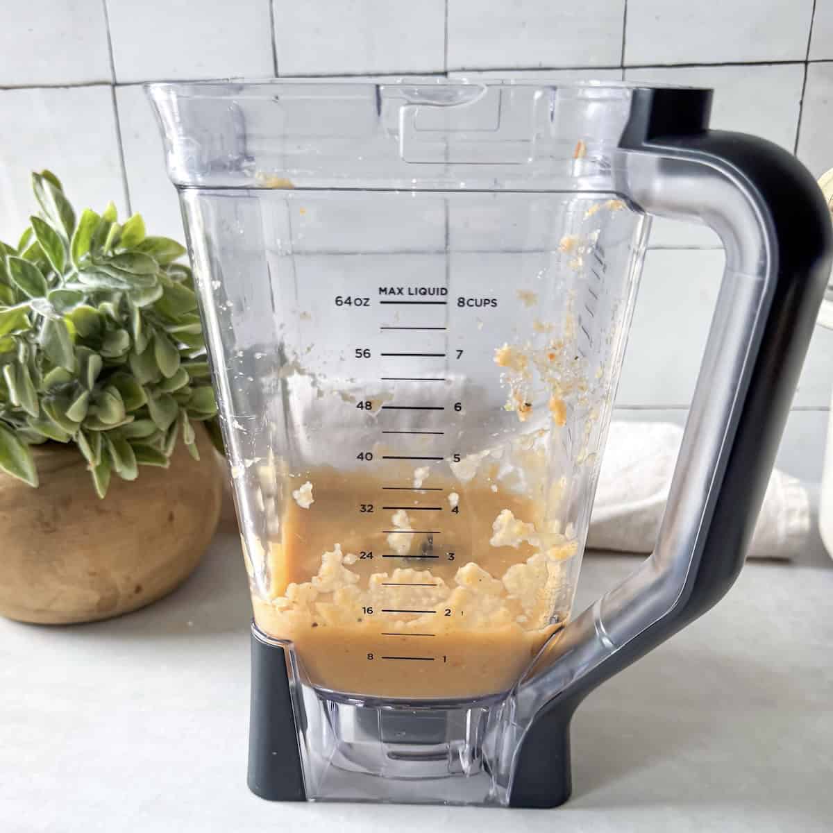 chicken pot pie soup in a blender side view.