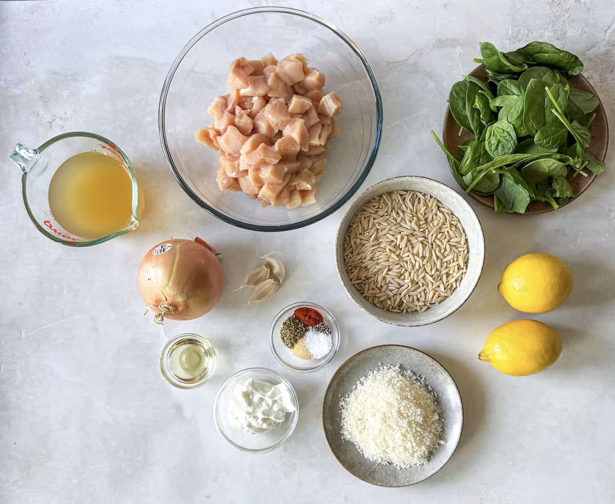 ingredients for lemon chicken orzo skillet on a table.