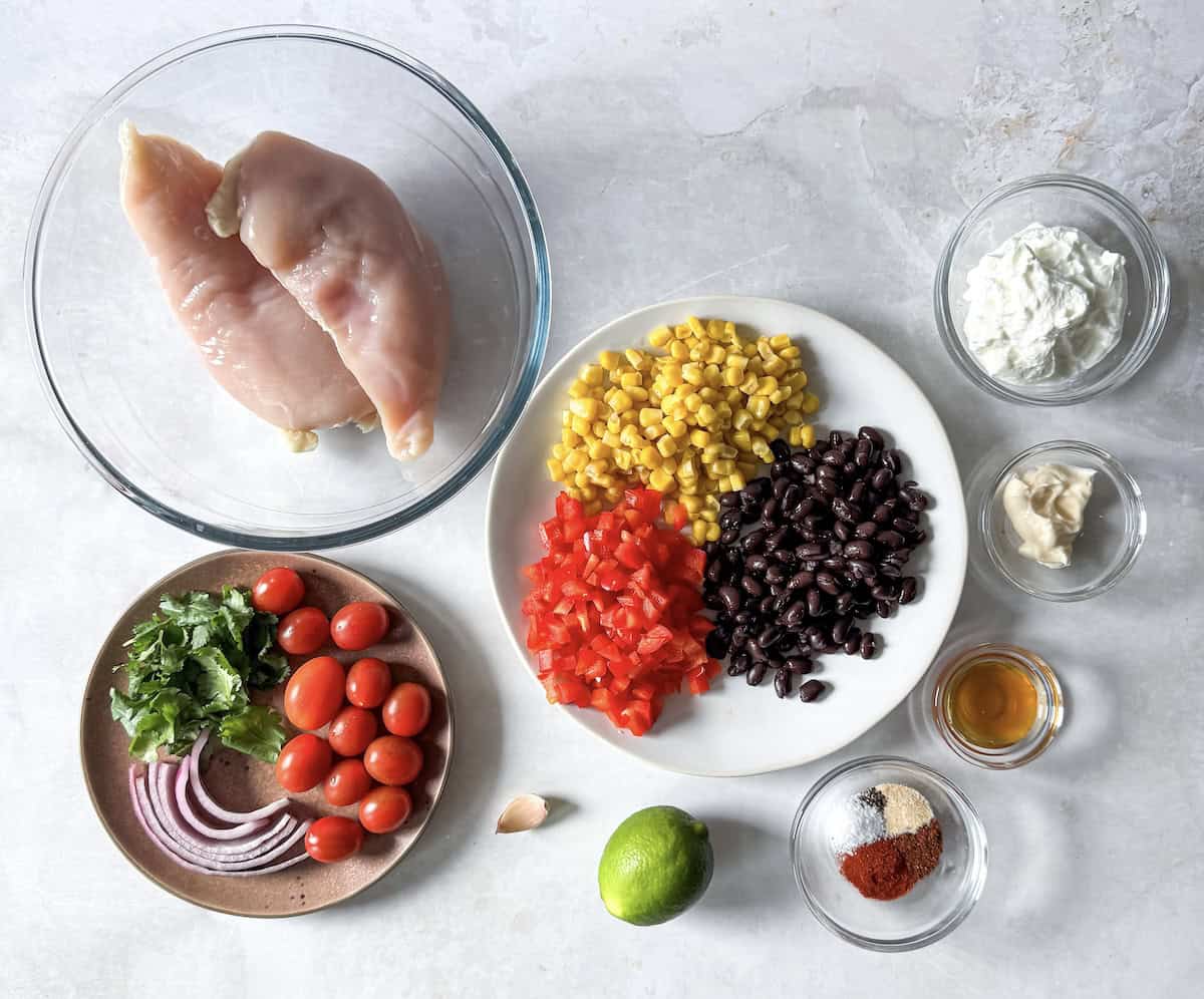 ingredients for southwestern chicken salad on a table.
