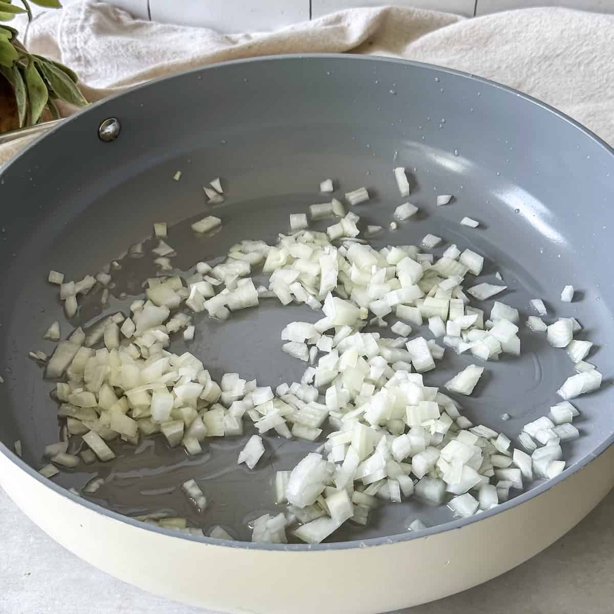 onion cooking in a skillet.