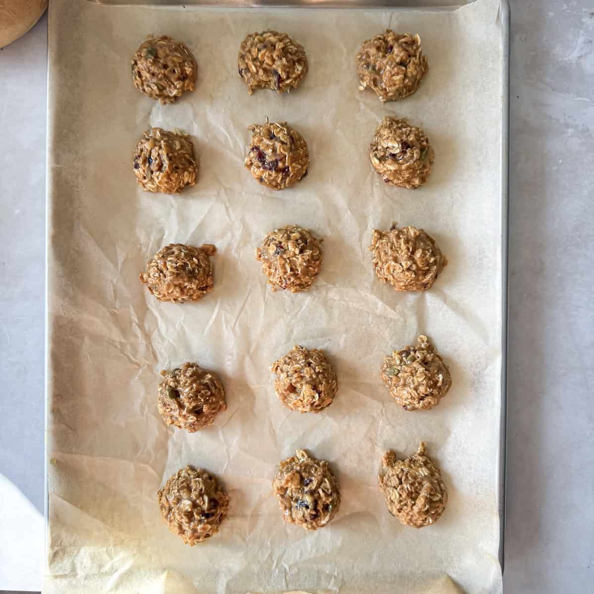 overhead view of breakfast cookies on a baking sheet.