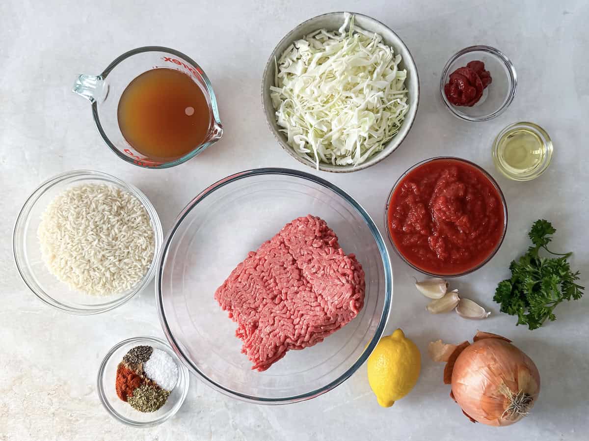 overhead view of unstuffed cabbage rolls skillet ingredients on a table.