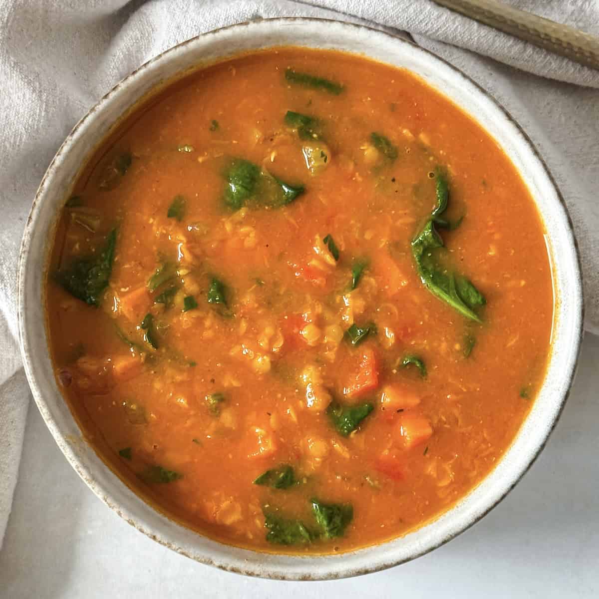 overhead view of lentil carrot ginger soup.
