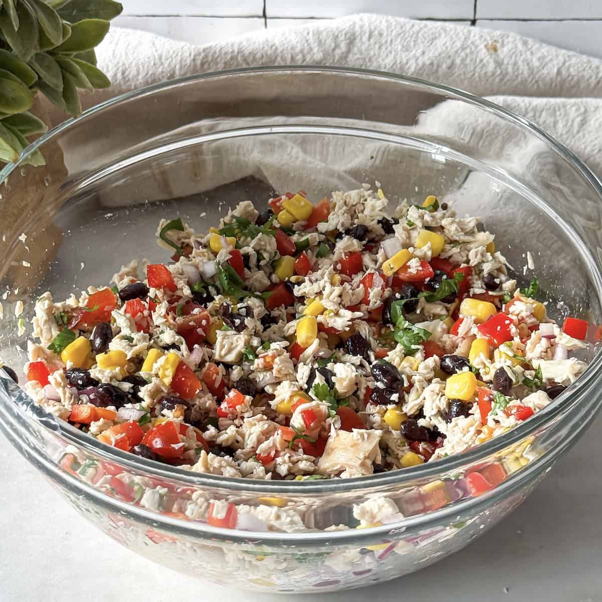 southwest chicken salad ingredients in a bowl.
