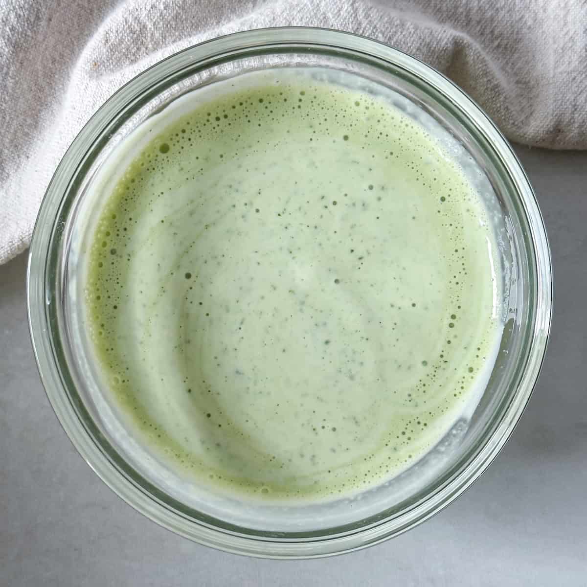 cilantro lime yogurt sauce over head view.