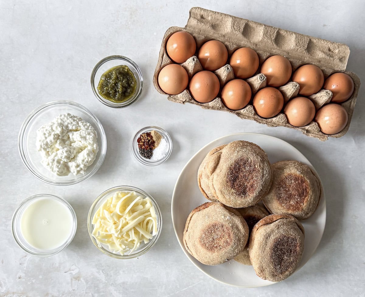 ingredients for pesto egg sandwich on a table.
