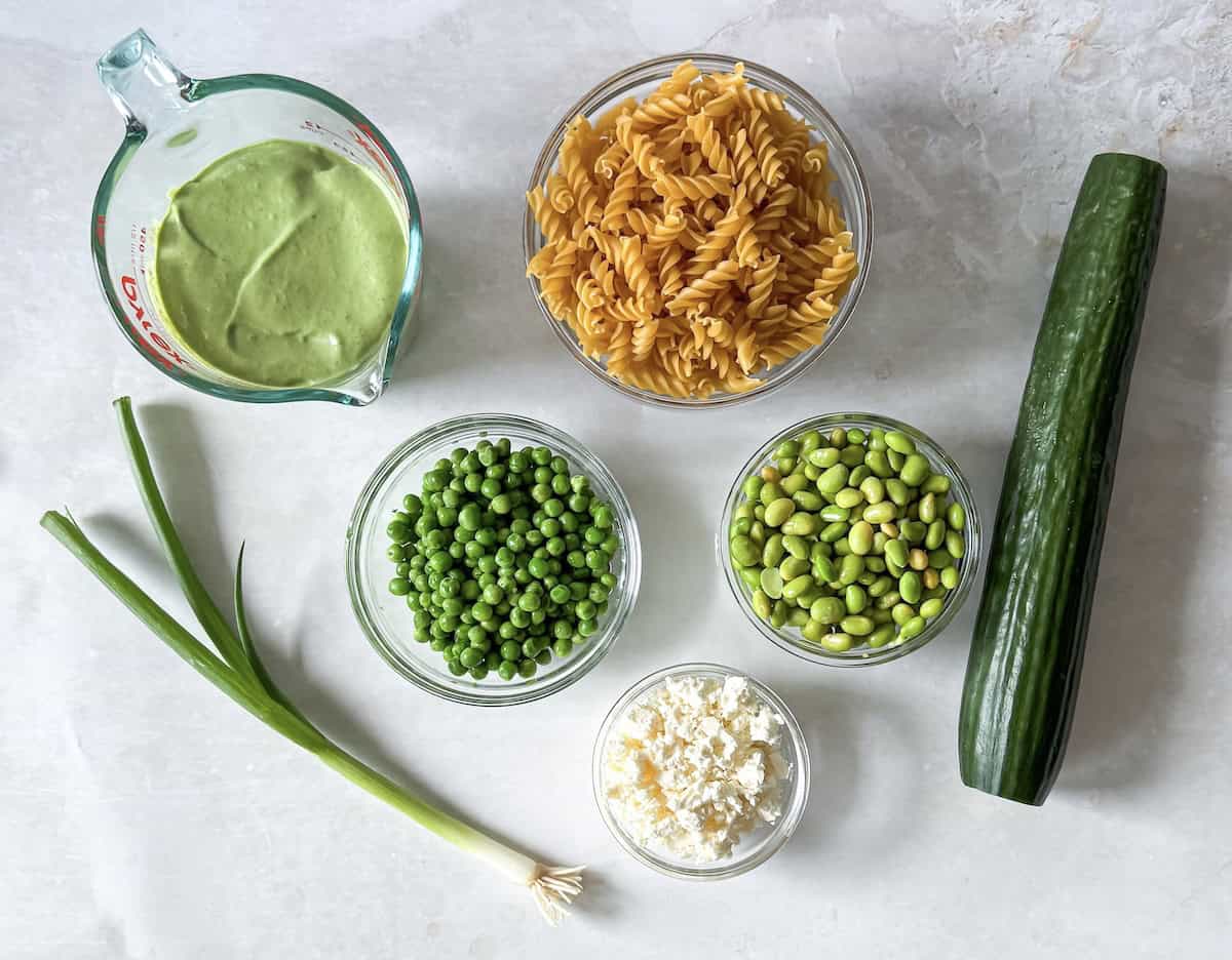 overhead view of ingrediens for green goddess pasta salad.