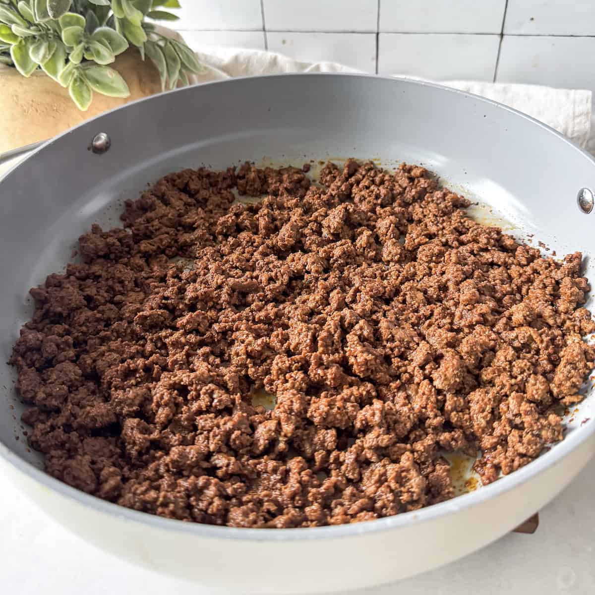 ground beef taco meat in a skillet.