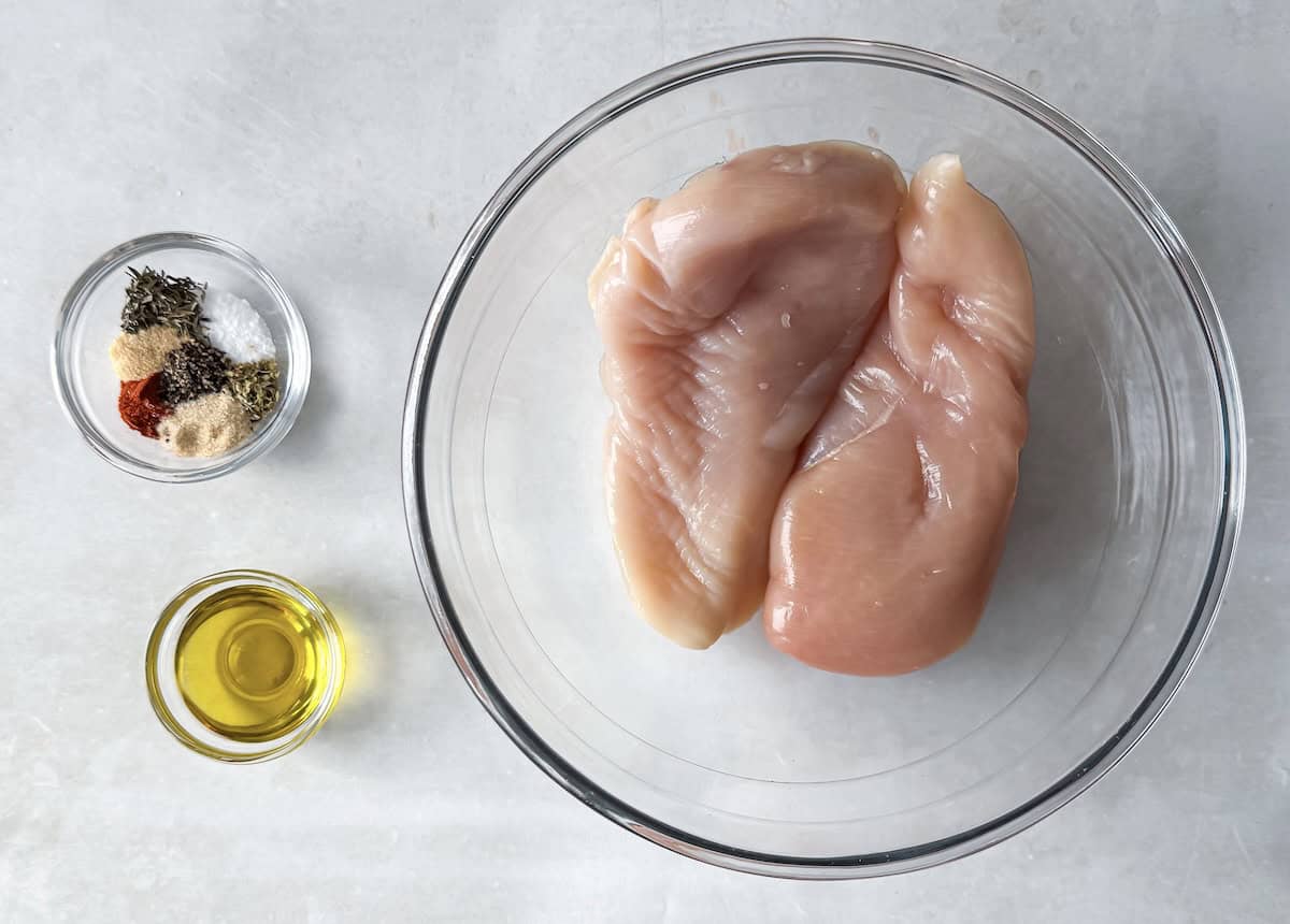 ingredients for oven baked chicken on a table.