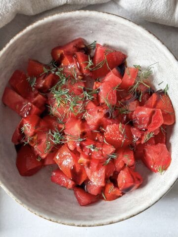 overhead view of tomato dill salad.