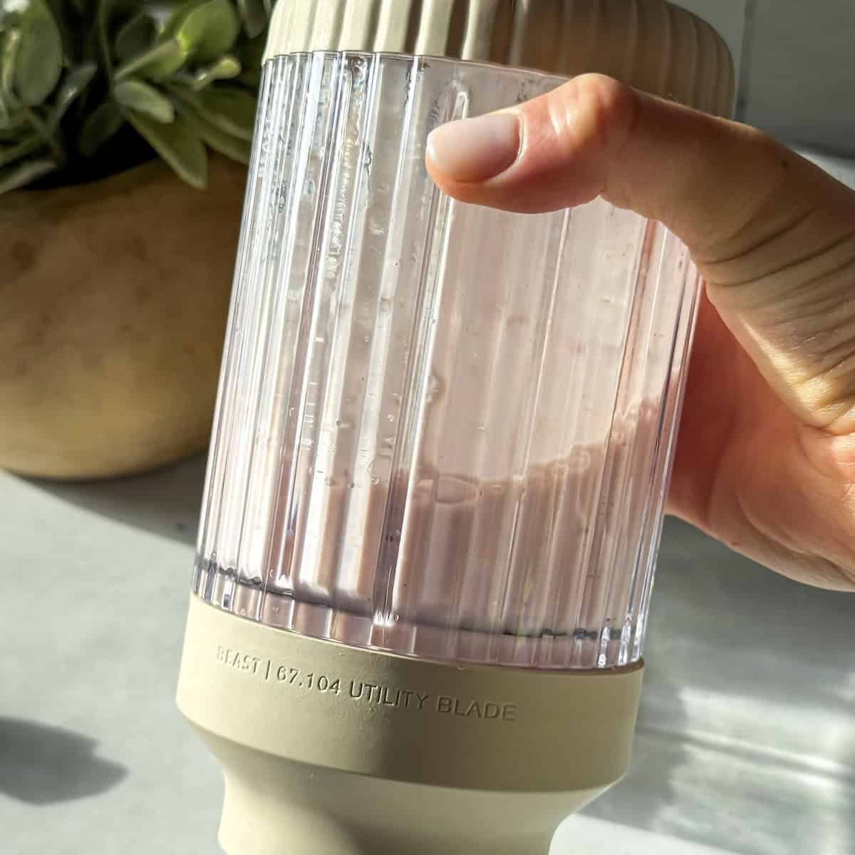 strawberry milk in a blender.