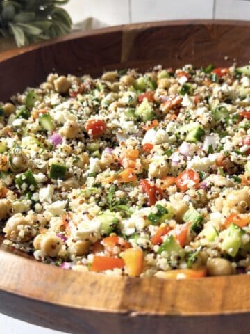 chickpea quinoa salad in a wooden bowl.