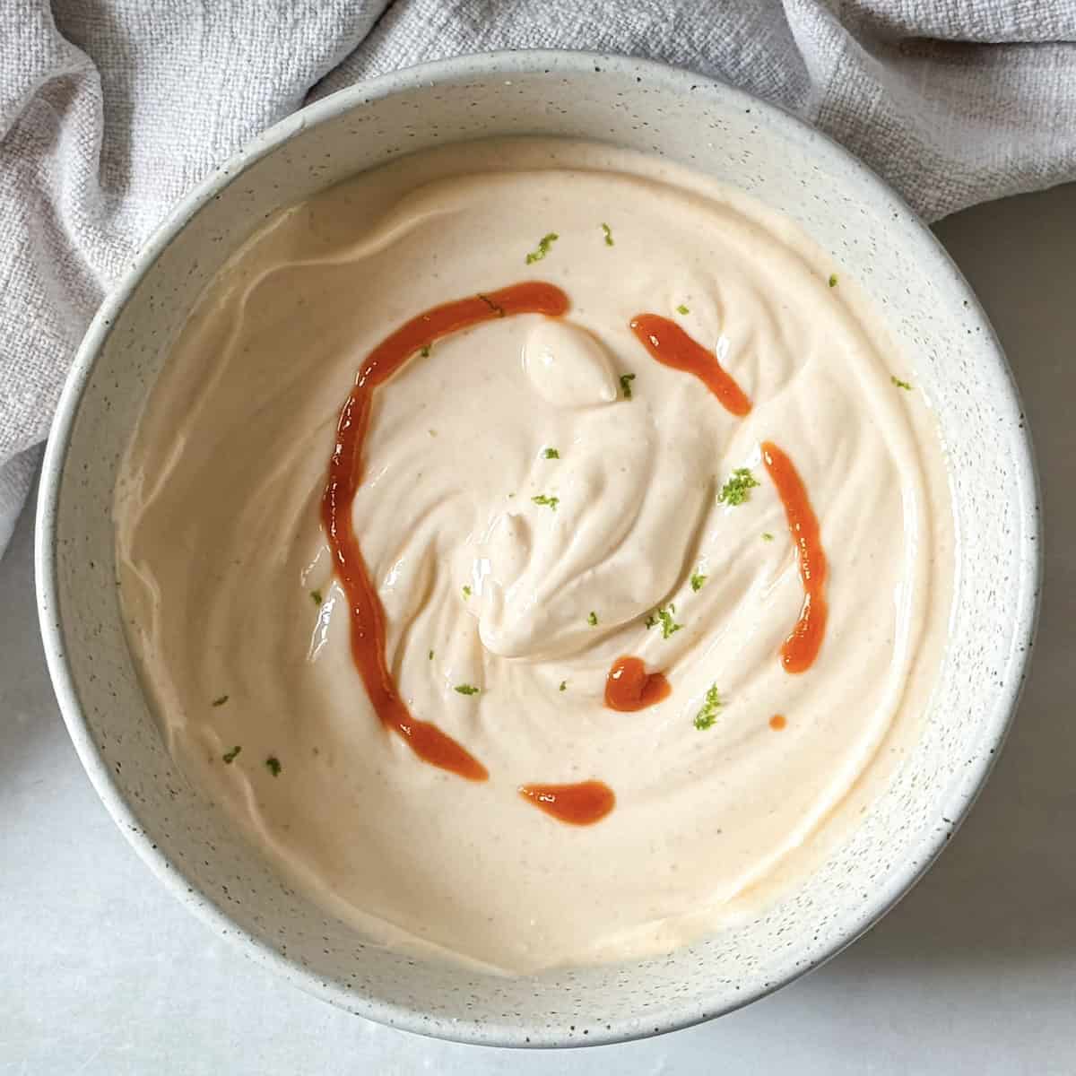 greek yogurt sriracha sauce overhead view..