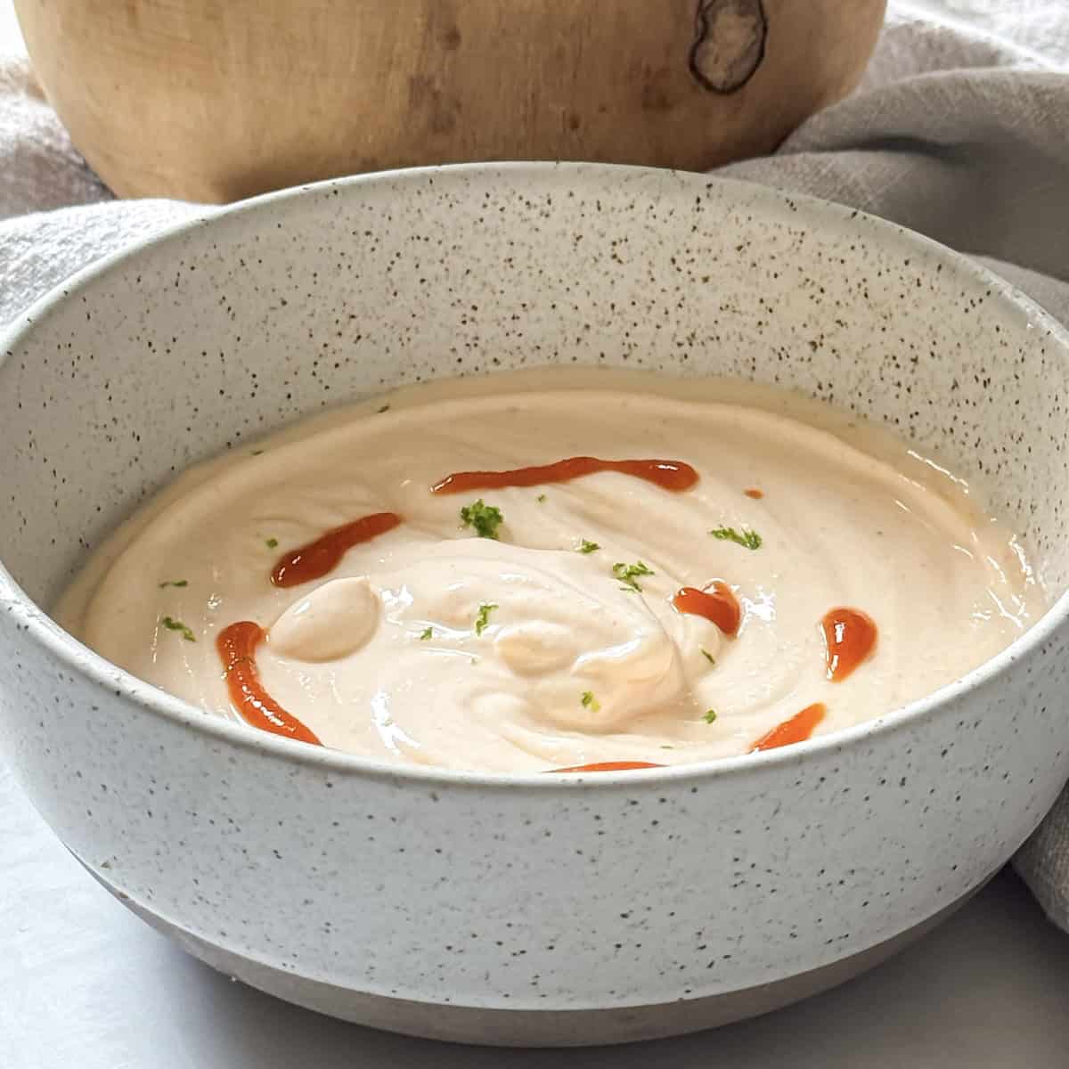greek yogurt sriracha sauce side view.