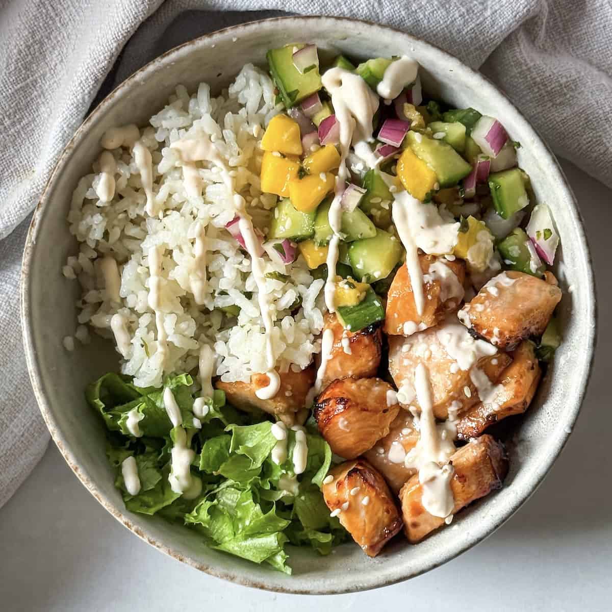 overhead view of salmon rice bowl.