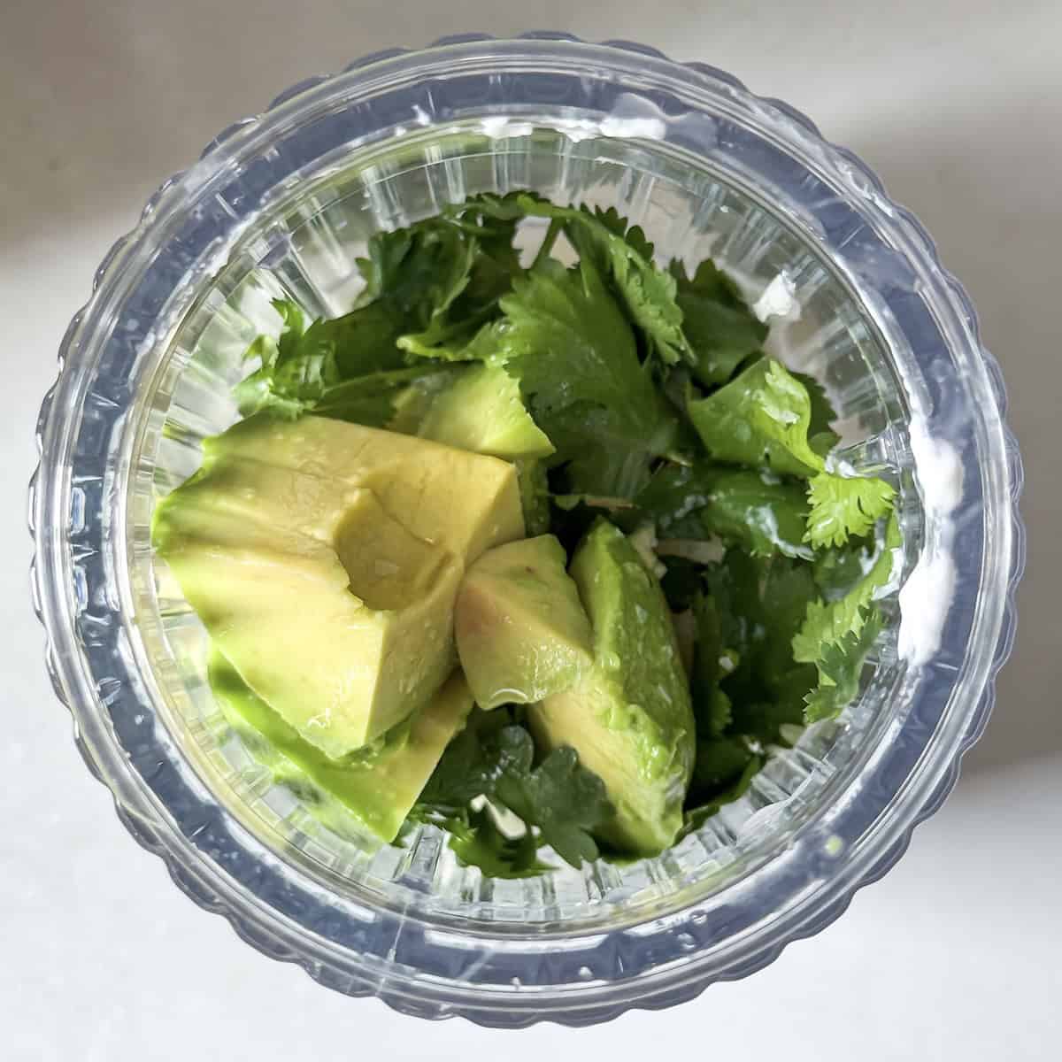 avocado and cilantro in a blender.