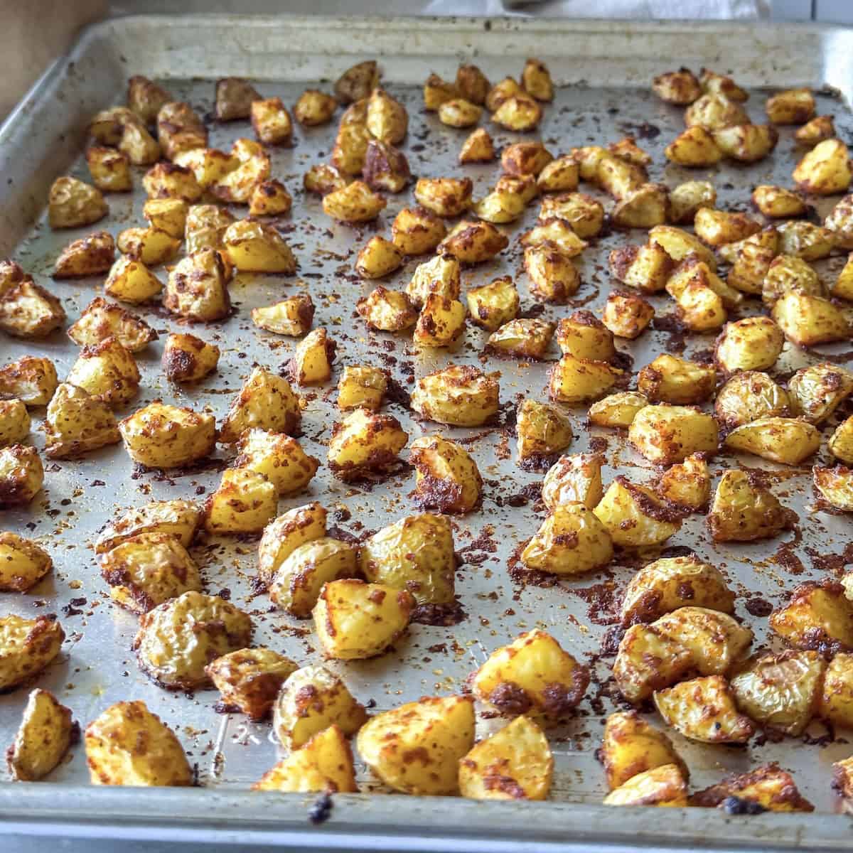 roasted baby potatoes on a sheet pan.