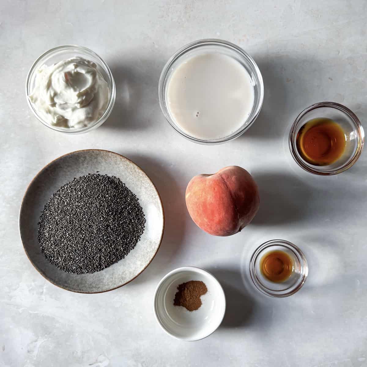 ingredients for peach chia pudding on a table.