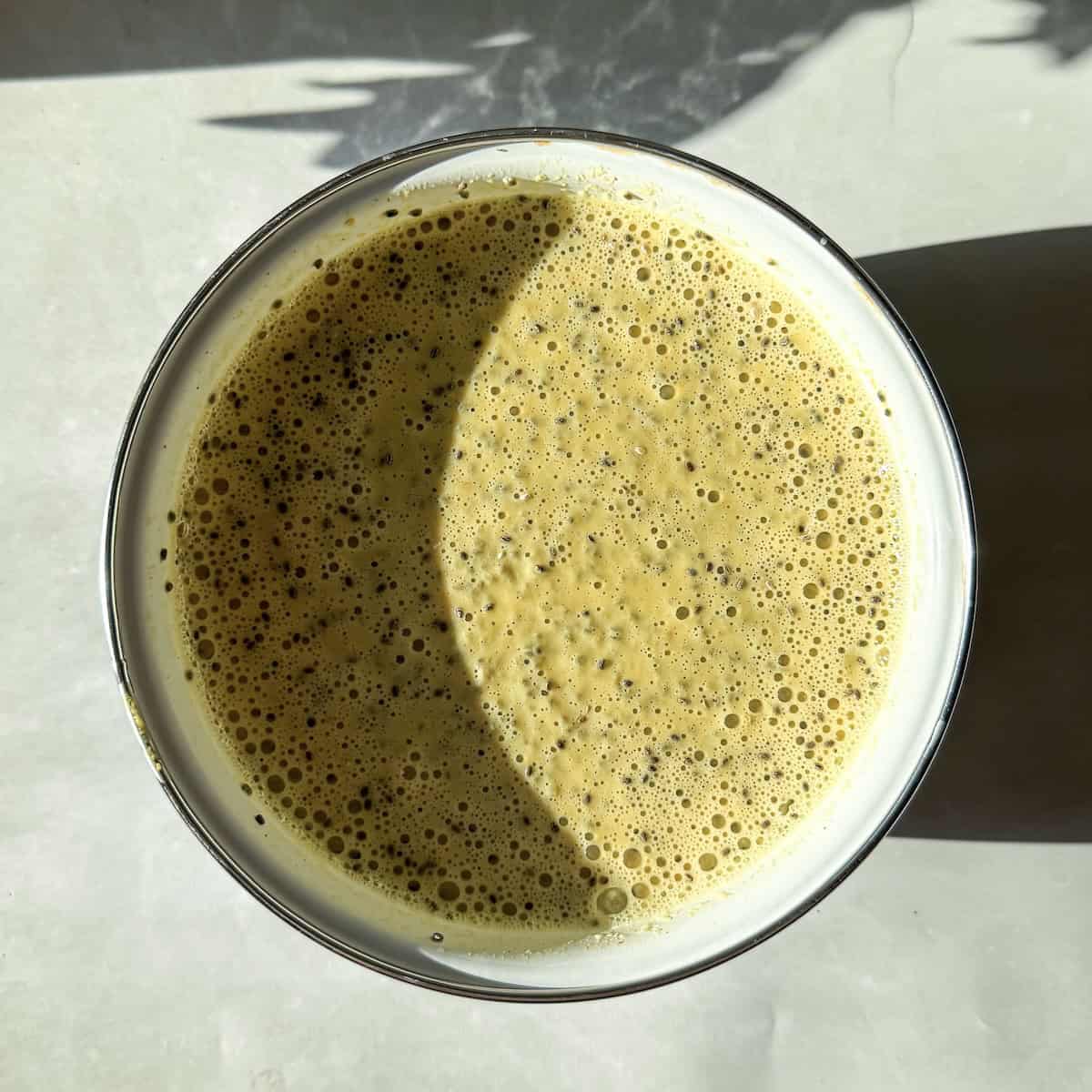 peach milk poured over chia seeds.