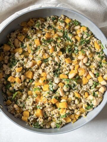 A turkey butternut squash kale and white bean skillet.