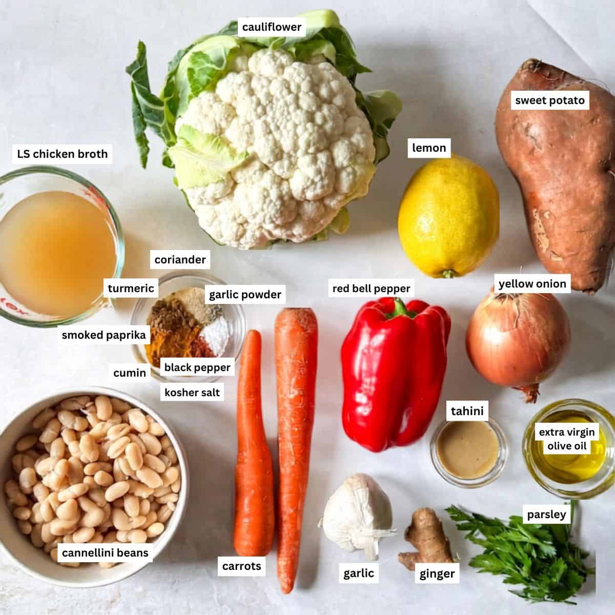ingredients for Golden soup laid out on a grayish white background with labels.