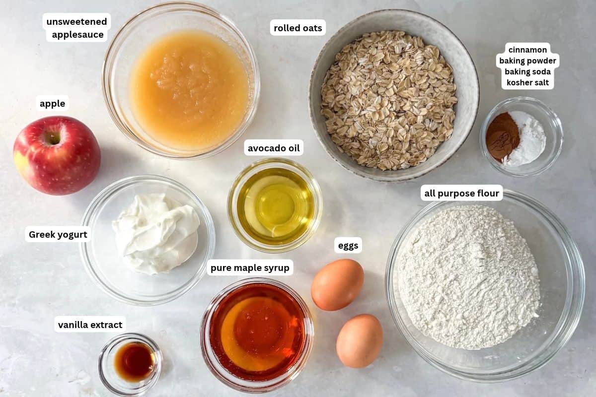 apple oat muffin ingredients in separate containers on a table labeled.