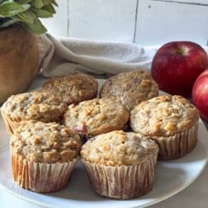 A plate of apple oat muffins right after coming out of the oven.